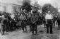 Romanian gendarmes and local collaborators during deportation of Jews to Transnistria. At head of column stands Rabbi Dov-Berl Yechiel. Briceva, Bessarabia, 1941. © Yad Vashem, courtesy of Gary Bartiny