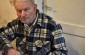 Vytautas G., born in 1929: “A week after the Jews of Kamajai were taken to Rokiškis to be murdered, the auction of their property took place in Kamajai. People from surrounding villages came here to buy things.” ©Cristian Monterroso/Yahad - In Unum