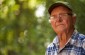 Stanislavs G., born in 1926, witnessed Jews being rounded up in the consumers’ cooperative building and saw the shooting at the Jewish cemetery while bringing lunch to his father, who had been requisitioned to dig a pit. ©Jordi Lagoutte/Yahad - In Unum