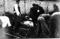 Limanowa 1942-1943. A group of Jewish men, wearing armbands, pulls along a wagon loaded with the bodies of sixty Limanowa Jews who were killed in the Jewish cemetery. ©Photo archive, taken from yadvashem.org 1605/1676