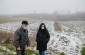 Yahad’s team at the execution site with a witness. © Piotr Malec/Yahad-In Unum