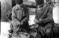 Two kolkhoz members checking poisoned seeds, 1932 © National Archives for Photos & Films, Kiev