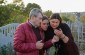 The Yahad-In Unum team with a Jewish survivor looking at the photos of the remaining Jewish heritage in Dzhuryn. ©Les Kasyanov/Yahad-In Unum