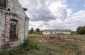 The former stables where a ghetto was created. About 2,800 Jews brought from Bessarabia and Bukovina were confined in this ghetto. The ghetto was fenced in with barbed wire and guarded by Romanians with dogs. © Aleksey Kasyanov/Yahad-In Unum