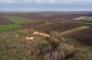 A drone view at the former clay quarry, abandoned today. The victims’ bodies were reburied in the center of the village. ©Les Kasyanov/Yahad - In Unum