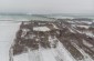 A drone view at the site of the former stables. The stable building no longer exists, today it’s a piece of farmland. ©Les Kasyanov/Yahad - In Unum