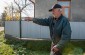 Gueorhyi S., born in 1922, pointing out the execution site where he saw an 18-year-old boy killed by Romanian soldiers. ©Les Kasyanov/Yahad-In Unum