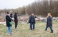 The Yahad team with a witness at the mass grave site. ©Les Kasyanov/Yahad - In Unum