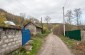 The former Jewish street in Vasyliv. Before the war, several Jewish families lived here. This is the road down which the Jews were taken to the Dniester to be killed.   ©Les Kasyanov/Yahad - In Unum.