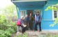 Yahad team in front of the house of Olga D. © Miguel Maldonado –Yahad-In Unum