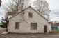 This house under the number 92 used to belong to a Jewish hairdresser. Today, it houses the local archives.   © Les Kasyanov/Yahad-In Unum