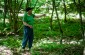 The witness, Bolesław R., born  in 1937, showing the location of the burial site of about eleven local Jews in the Łaziska forest. ©Piotr Malec/Yahad - In Unum