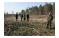 Yahad’s team with the witness at the execution site near the village of Borove. ©Guillaume Ribot/Yahad-in Unum