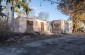 Partially destroyed building of the former Jewish school. © Les Kasyanov/Yahad-In Unum.