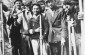 Mayo de 1942. Retrato grupal de judíos en trabajos forzados construyendo una carretera en Kolbuszowa.  Entre los que aparecen en la foto está Manius Notowicz (derecha) y Mondi Stub (centro junto a la joven). ©Crédito de la foto: Museo Estadounidense Conme