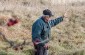 Gueorhyi S., born in 1922, near the mass grave where the corpses of the Jewish victims were buried. Les Kasyanov/Yahad-In Unum