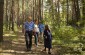 Yahad team with the witness on the execution site of about 3,000 Jews. The execution site is located in the woods.  © Victoria Bahr/Yahad - In Unum