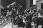 Market in Tarnow. Stall with traders and buyers with armbands.© Taken from sztetl.org.pl