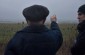 Mikhail shows our team where the anti-tank ditch is located. © Cristian Monterroso/Yahad-In Unum