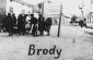 The entrance to the Jewish ghetto in Brody with the sign in three languages: Polish, Ukrainian and German.  ©USHMM Photo Archives
