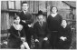 1930. Jewish family in Kolbuszowa: Hersh (Sonel) Yaacov and Dobe (Mania) Kornbluth Silber (seated on the right) with their children, Rachel (seated front, left), Mosyc Aaron, and Bracha (standing in back). © USHMM, courtesy of Norman Salsitz