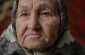 Polina V., born in 1930: “The victims were ordered to strip naked and throw their clothes on a pile before standing next to the pit.” ©Les Kasyanov/Yahad - In Unum