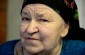 Zuzana S., born in 1933: “After the execution of Volek Haizi, I saw his grave covered with fresh soil. I often passed by this place while going to the hill to milk the cattle.” ©Kate Kornberg/Yahad - In Unum