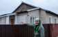 Galina K. pointing out the location of the barn in which the Jews were burned alive. ©Les Kasyanov/Yahad - In Unum