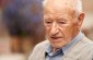 Ivan S., born in 1929: “In 1944, the Germans brought POWs in special trucks to the forest near Zabolocki, where they uncovered the mass grave, exhumed the bodies, and burned them using fuel oil and wood.” ©Jordi Lagoutte/Yahad - In Unum