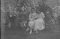 "Saturday afternoon in Rowne [Rivne]": a group of unidentified men and women posing together in a garden. 1921© From the Archives of the YIVO Institute for Jewish Research