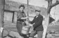 October 8, 1940. Two Jewish siblings draw water from a well in the Kolbuszowa ghetto. Pictured are Manius and Niunia Notowicz. ©Photo Credit: United States Holocaust Memorial Museum, courtesy of Max Notowitz